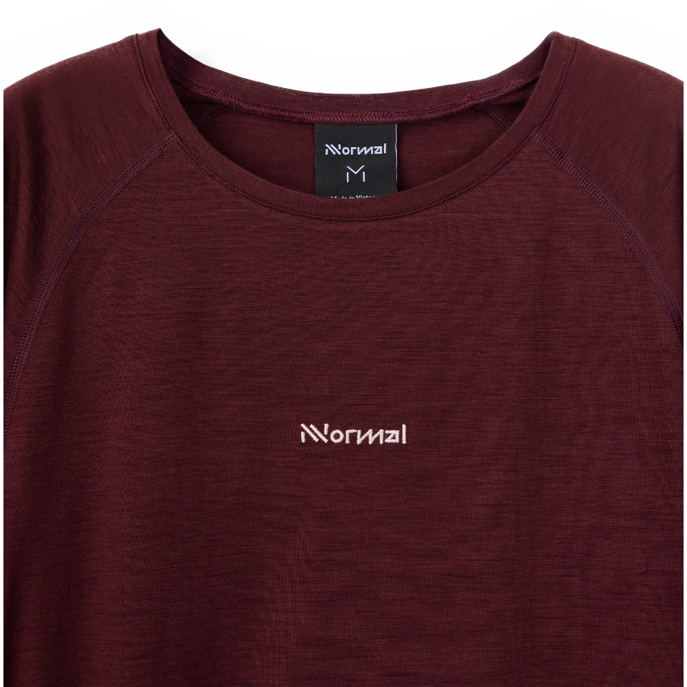 Maroon t-shirt with 'Normal' logo on a white background